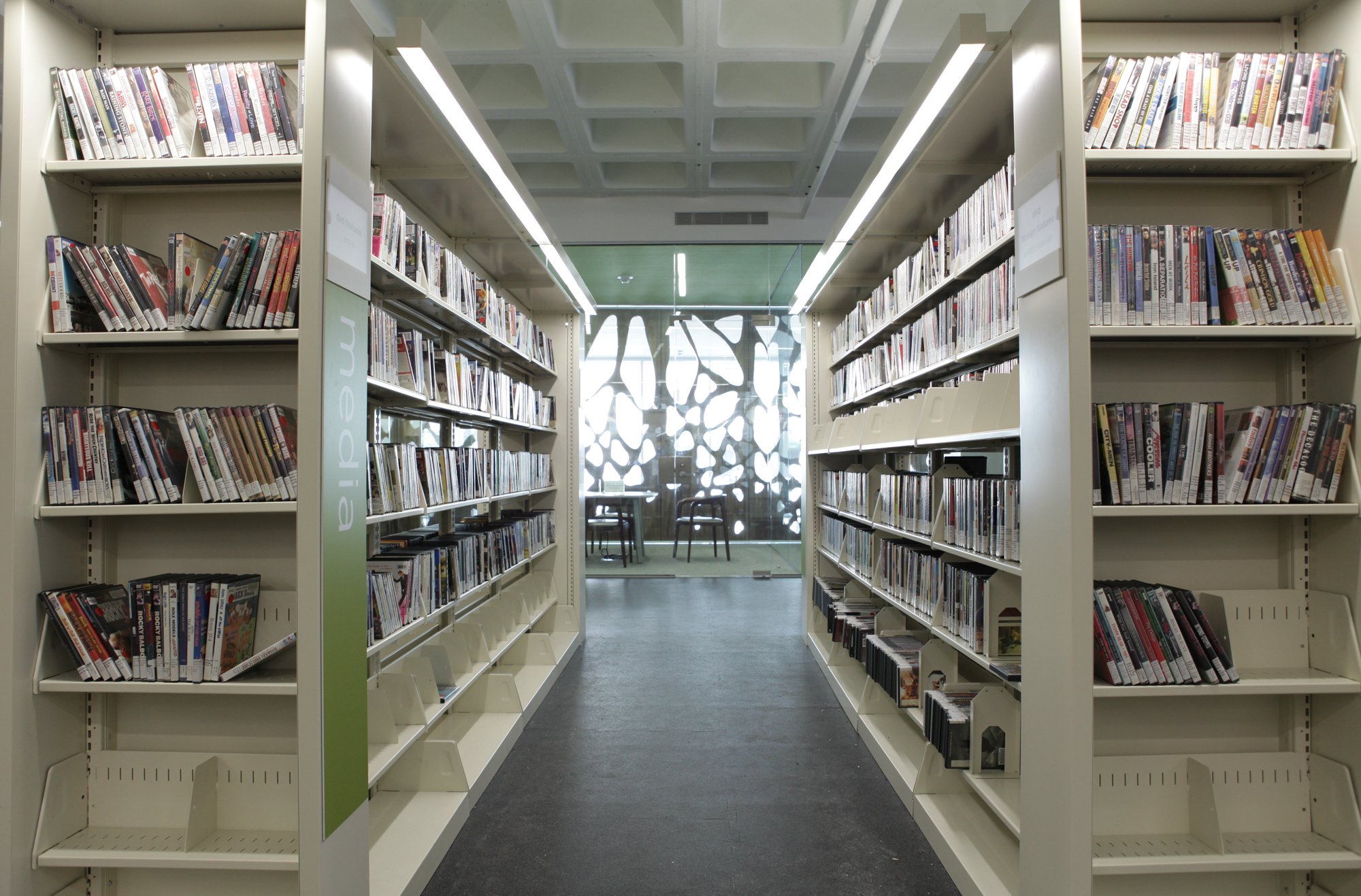 media collection on cantilever shelving at Public Library