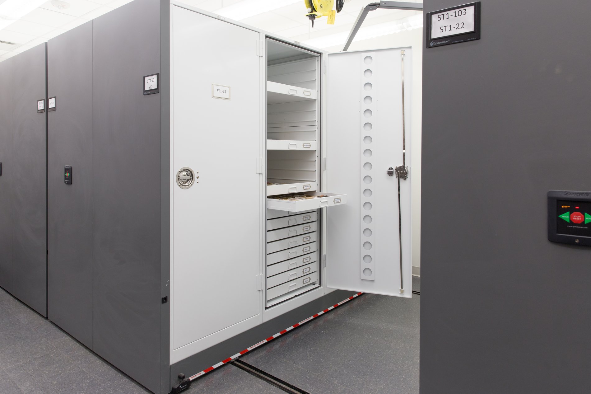 Historic Museum Collection - Museum Storage Cabinets on Mobile Shelving with Flat File Pull out drawers.