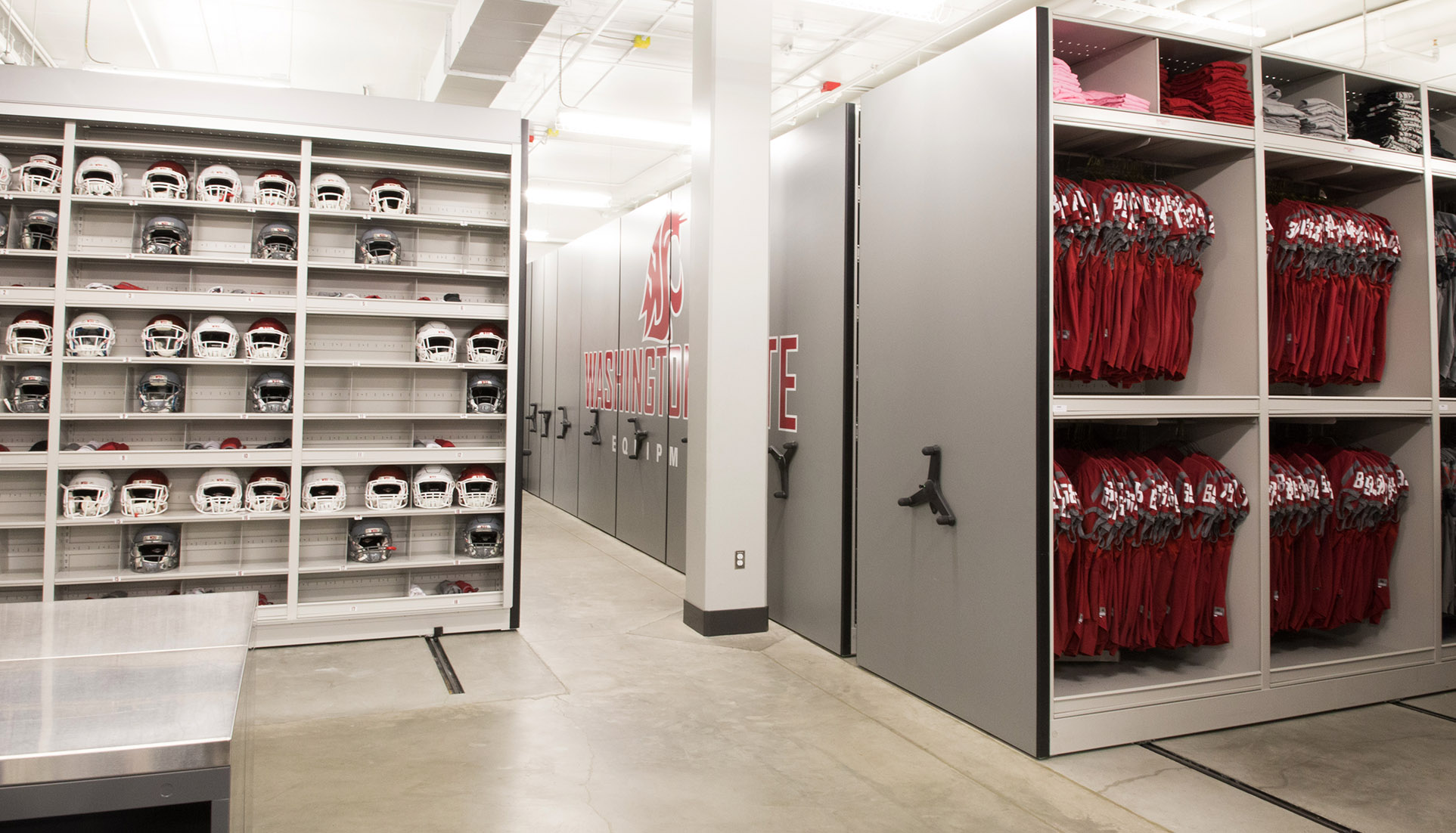 Jersey storage on haning shelves on high-density mechanical assist mobile shelving