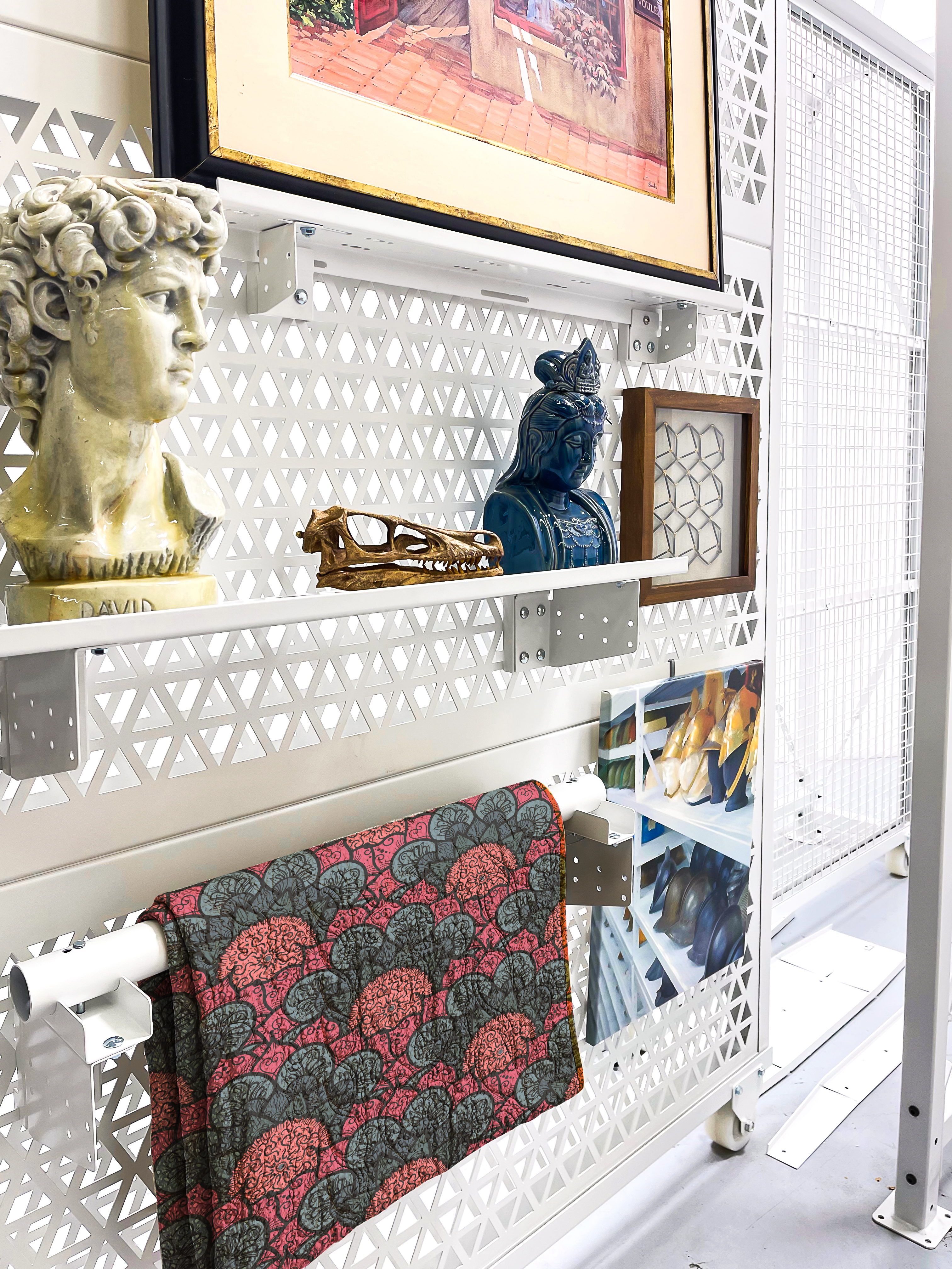 Display shelving on art racks 