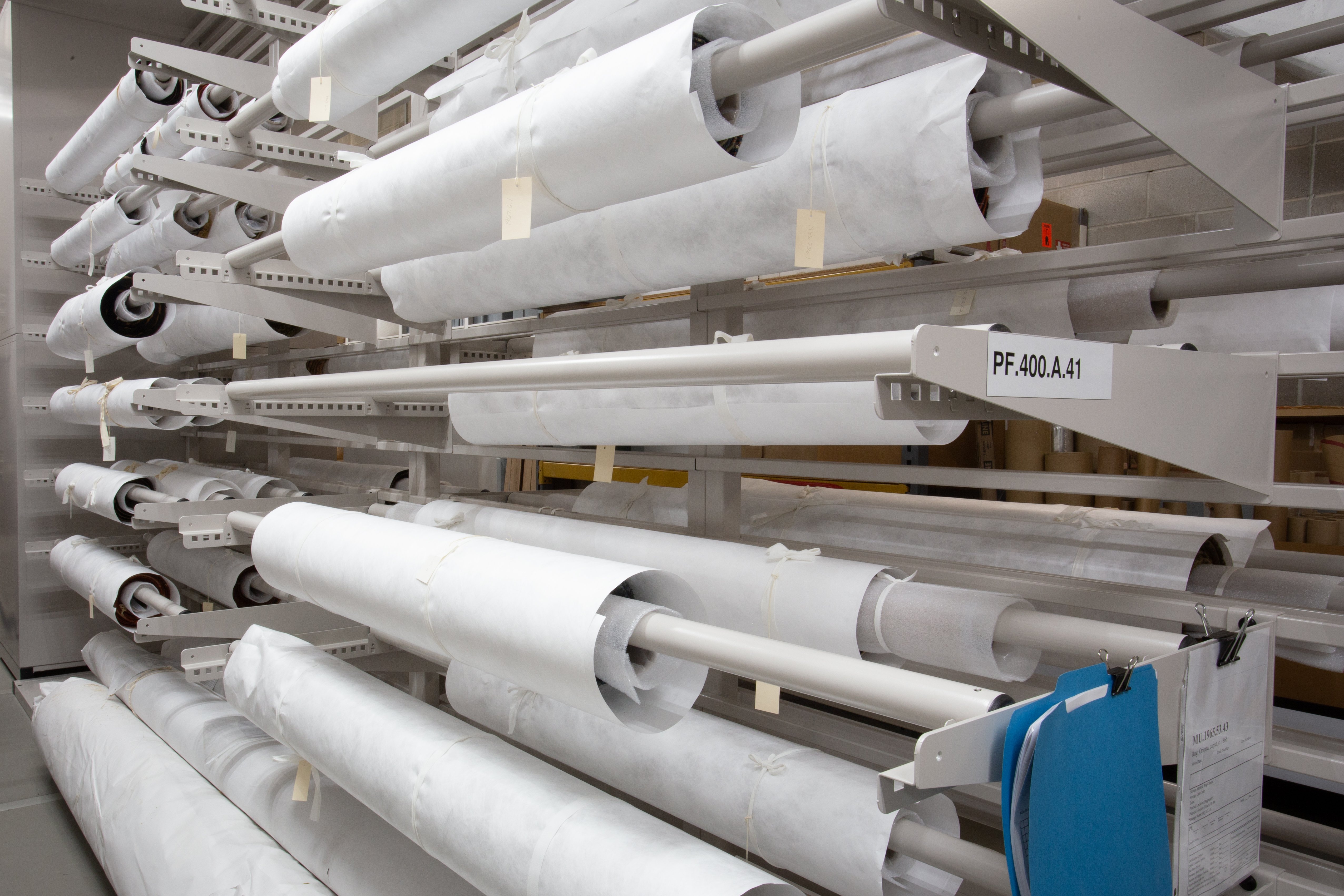 rolled historic flag shelving system